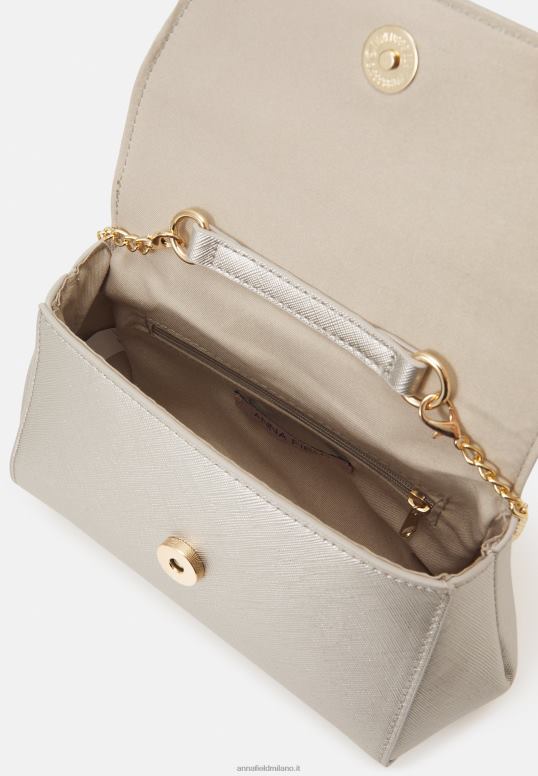 TX2DF2447 donne Anna Field pochette color oro